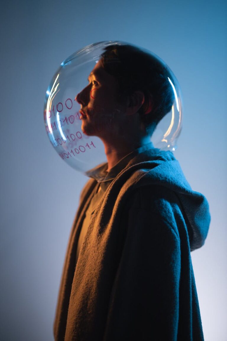 man with fish bowl on his head